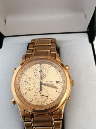 Reloj Seiko Quartz world time. 