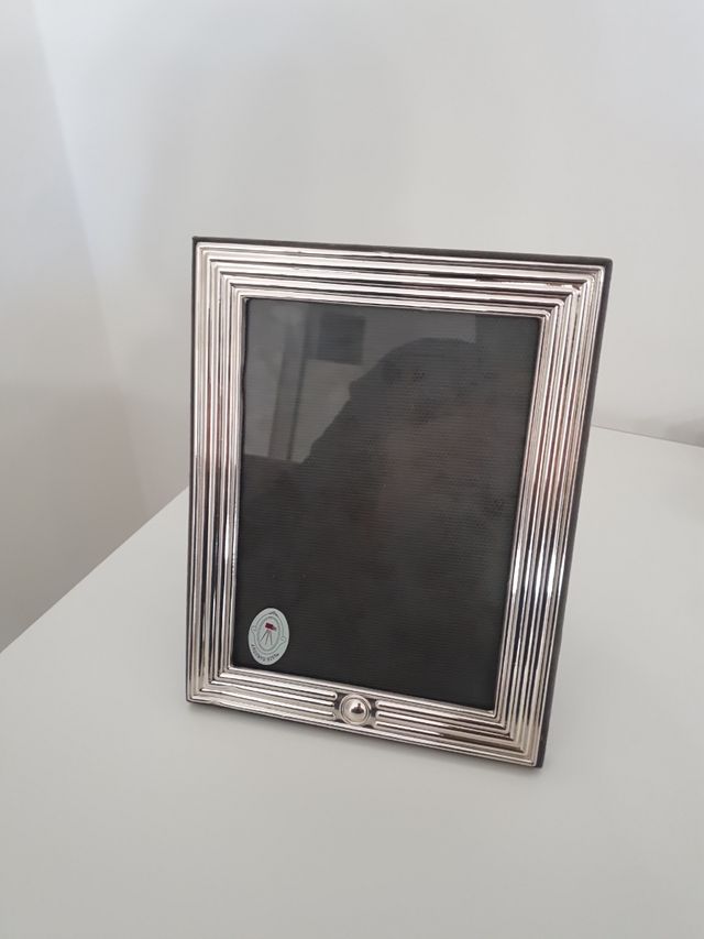 Cornice in argento