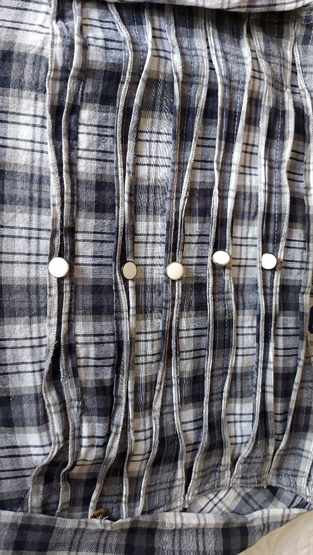 Blusa Adolfo Dominguez.