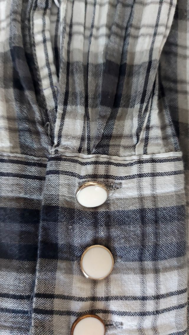 Blusa Adolfo Dominguez.