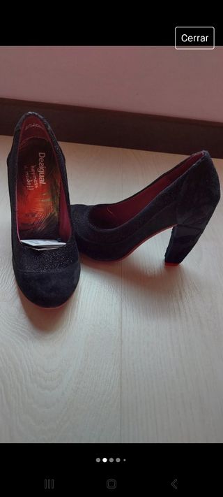 Zapato negro piel desigual