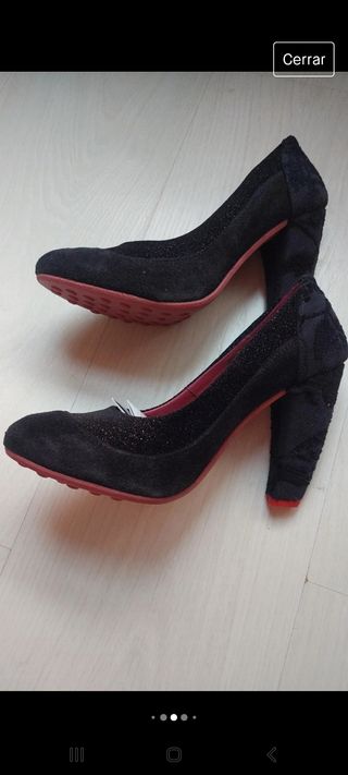 Zapato negro piel desigual