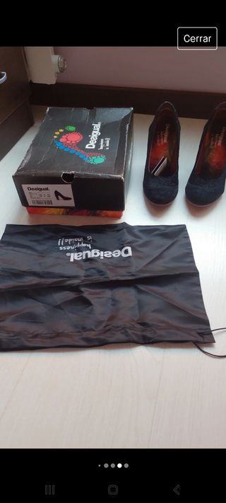 Zapato negro piel desigual