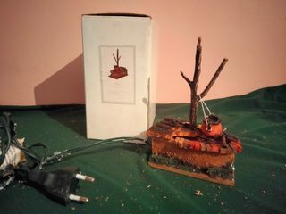 Olla caldero columnas romanas luz Belén