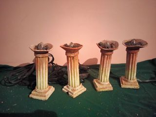 Olla caldero columnas romanas luz Belén