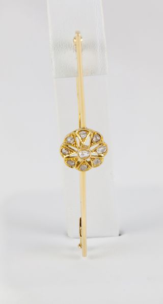 Broche antiguo en oro amarillo 18k y brillantes