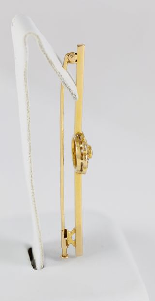 Broche antiguo en oro amarillo 18k y brillantes
