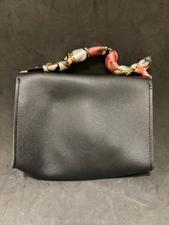 Stupenda pochette mini a mano