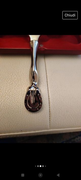 Apribottiglia a forma ferro di cavallo