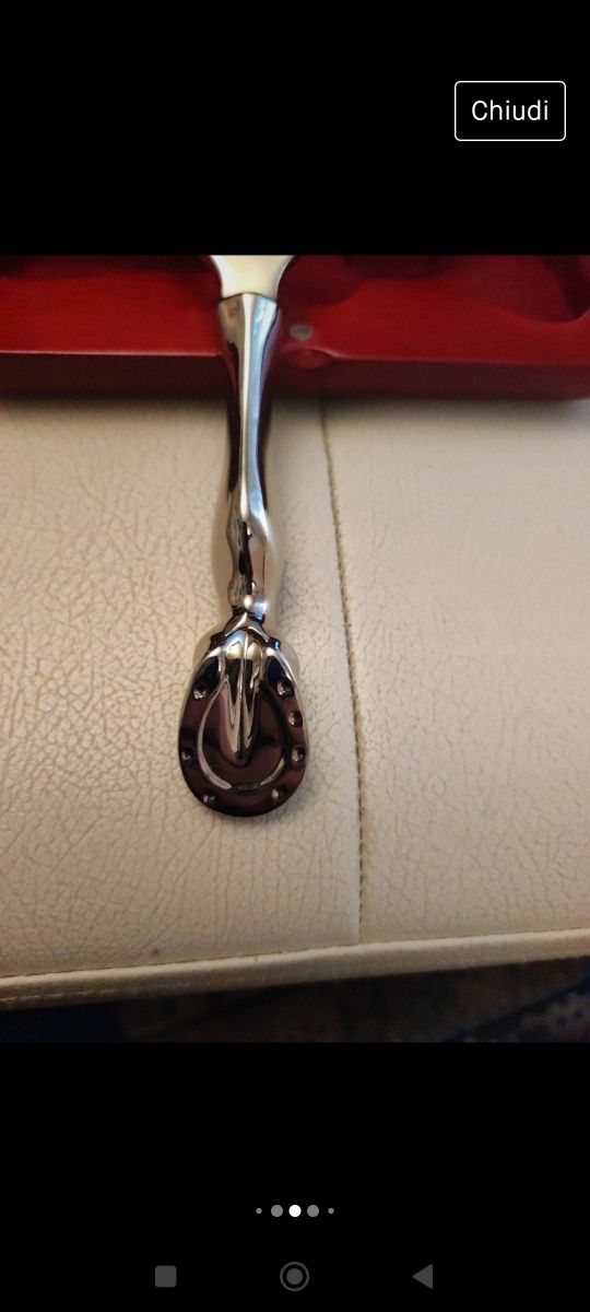 Apribottiglia a forma ferro di cavallo