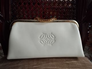 Cartera de mano en piel