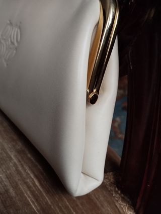 Cartera de mano en piel