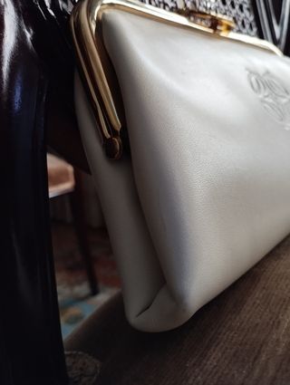 Cartera de mano en piel