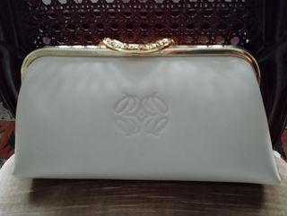 Cartera de mano en piel