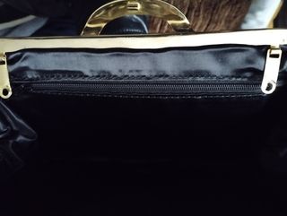 Cartera de mano en piel