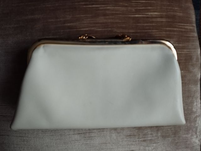 Cartera de mano en piel