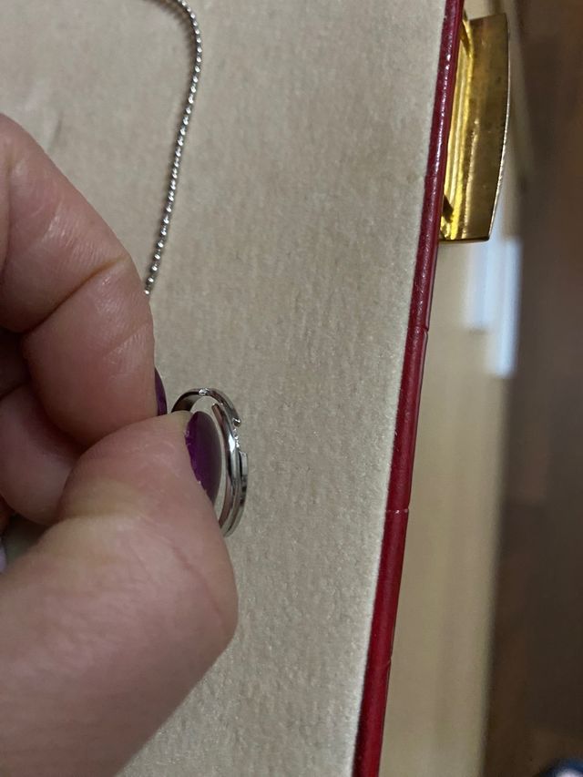 collana con ciondolo quadrifoglio e anello 
