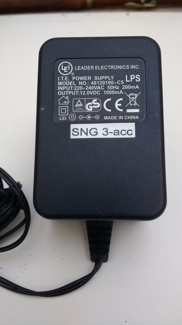 Cargador, adaptador, transformador