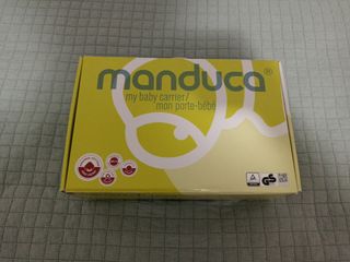 Mochila bebé manduca.