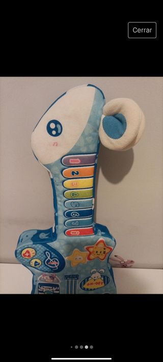 Guitarra de  peluche musical