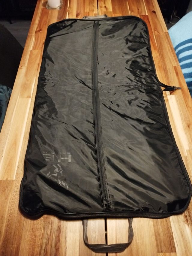 Abrigo de vestir homini emerito con funda