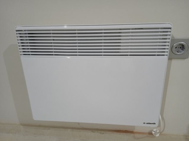 Radiador calefactor eléctrico de pared