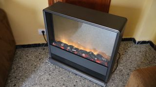 Estufa eléctrica,además visualiza fuego artificial