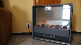 Estufa eléctrica,además visualiza fuego artificial