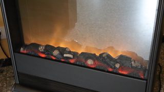 Estufa eléctrica,además visualiza fuego artificial