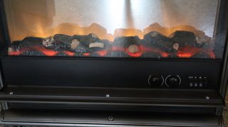 Estufa eléctrica,además visualiza fuego artificial