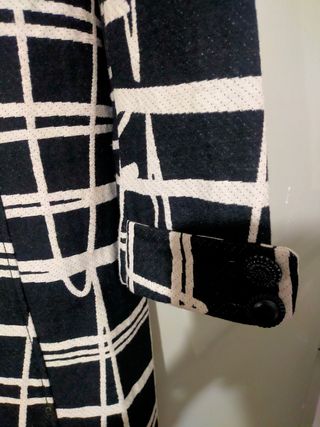 Abrigo desigual,como nuevo,muy poco uso,