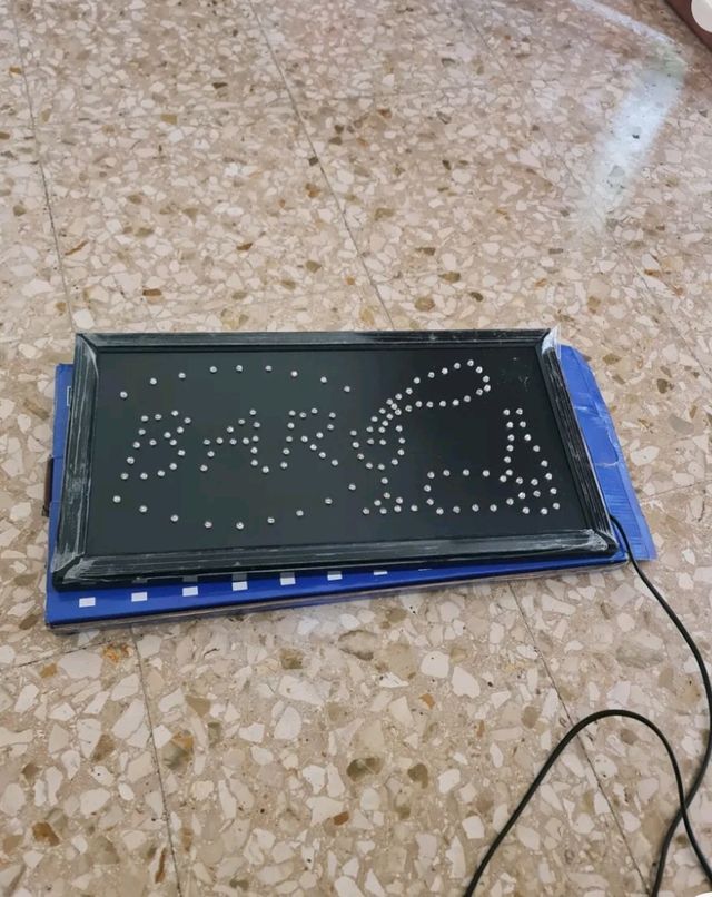 Insegna luminosa bar