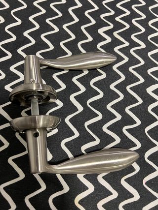 Manivela cromada para puerta de interior