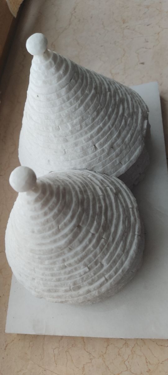 Trulli in miniatura in pietra