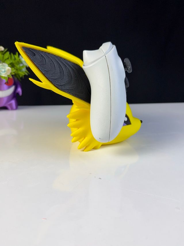 SOPORTE UNIVERSAL MANDO JOYSTICK JOLTEON POKEMON