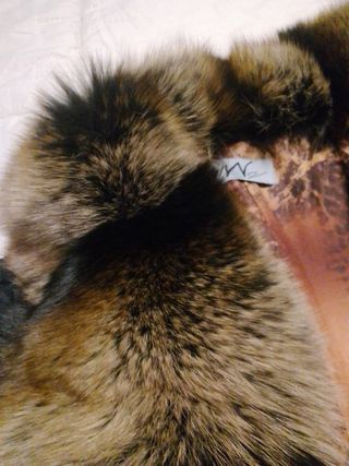 Giacca con collo in pelliccia 