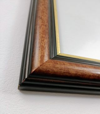 Marco de madera y dorado