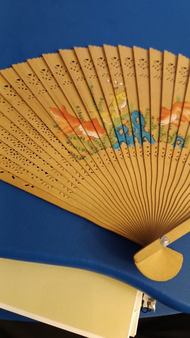Abanico de madera chino