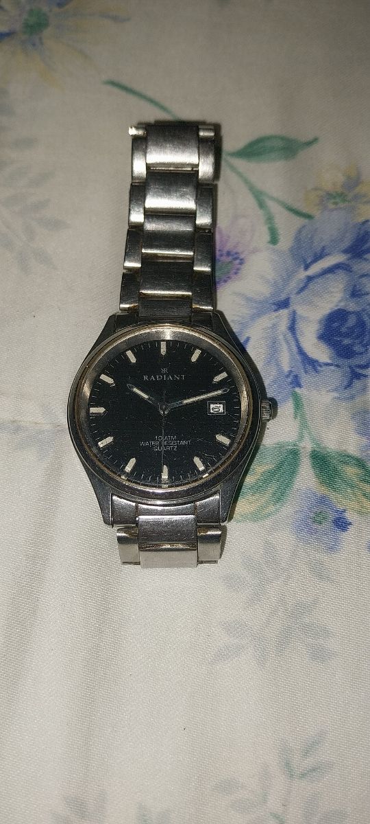 RELOJ DE CUARZO MUY BUENO DE ACERO0