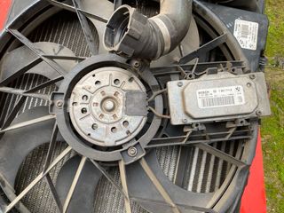 Radiador de agua y electroventilador Bmw serie 1
