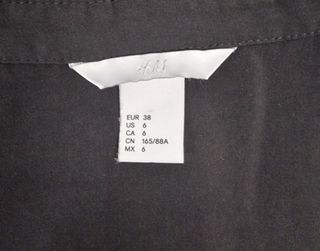 Blusa negra botones ocultos Talla38 H&M