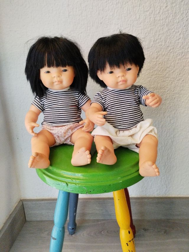 2 Muñecos asiáticos