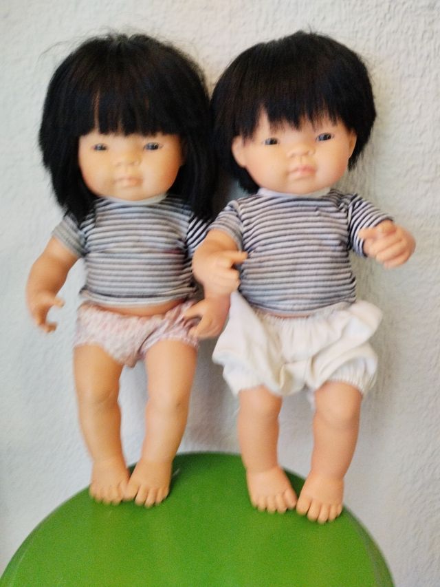 2 Muñecos asiáticos