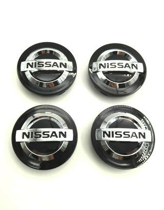 4 CENTROS DE RUEDA NISSAN 54mm NEGRO
