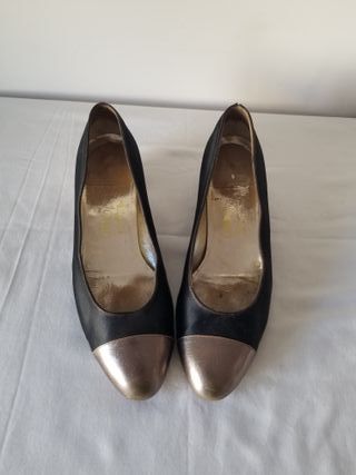 bailarinas Ferragamo negras y doradas