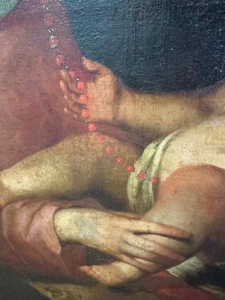 Virgen del Rosario con niño en brazos.