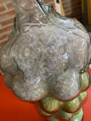 Botella de cristal con sales de baño decorativas