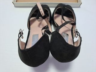 Zapatos talla 39 con tacón excelente estado.