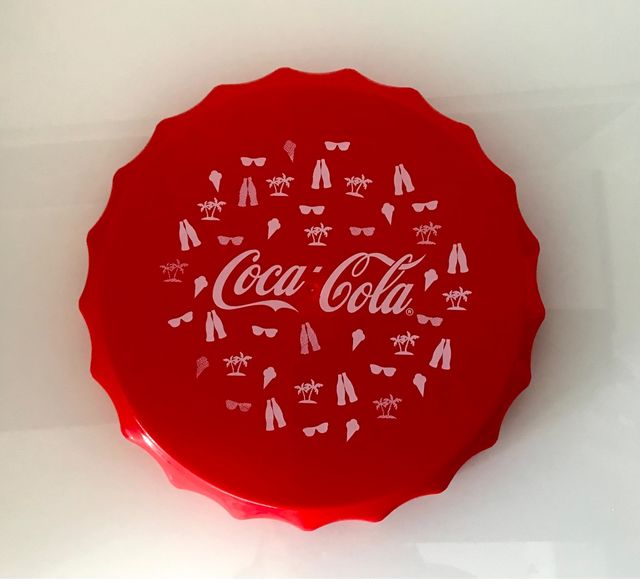 Frisbee, imitando a una chapa de Coca Cola Coke