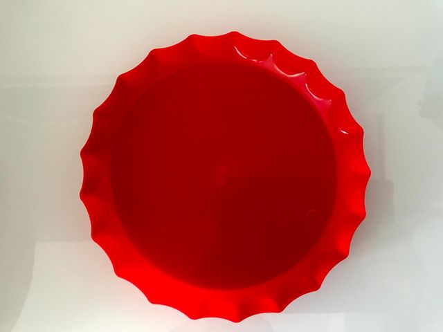 Frisbee, imitando a una chapa de Coca Cola Coke